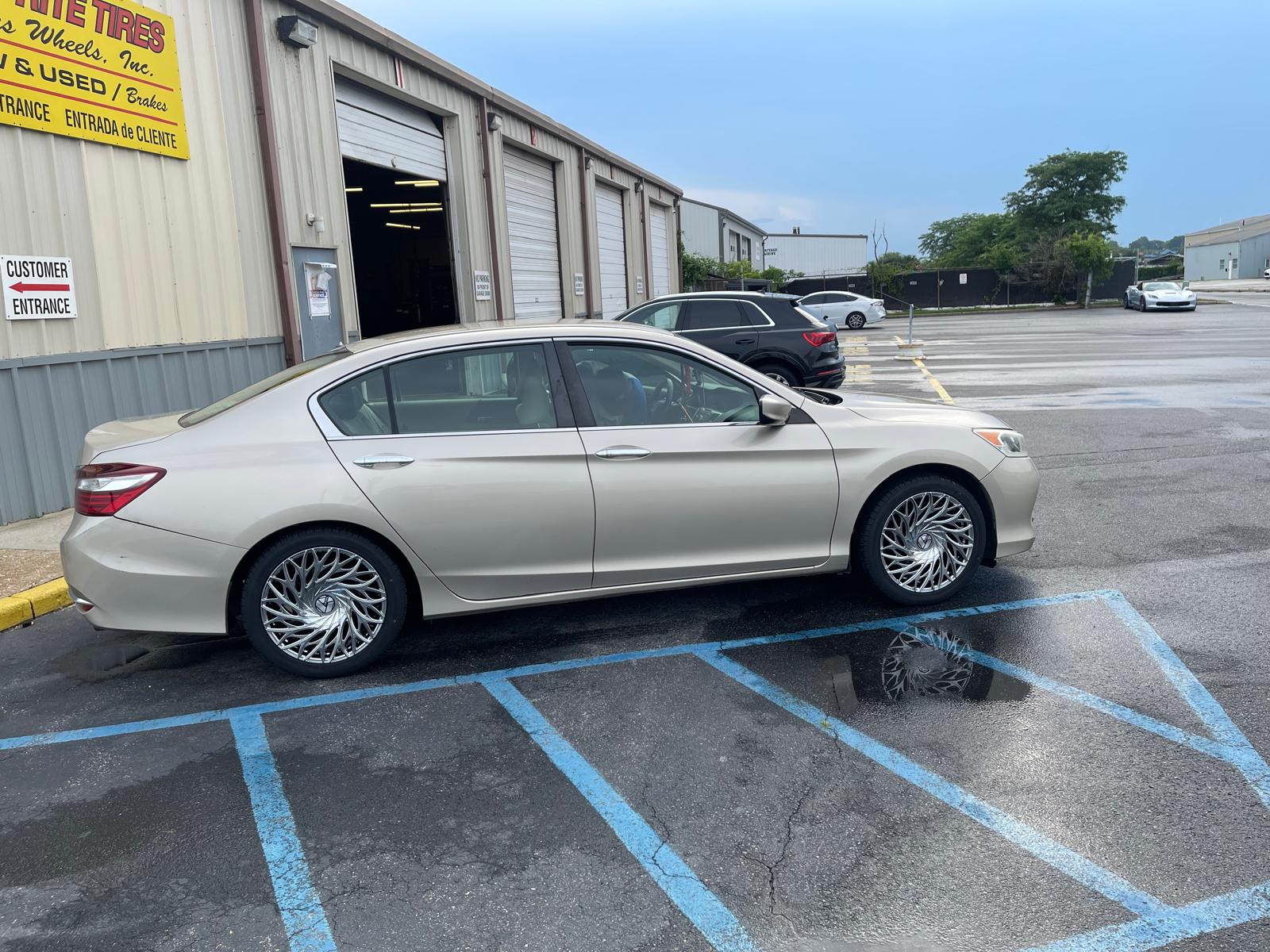 Honda Accord with custom chrome spinning wheels