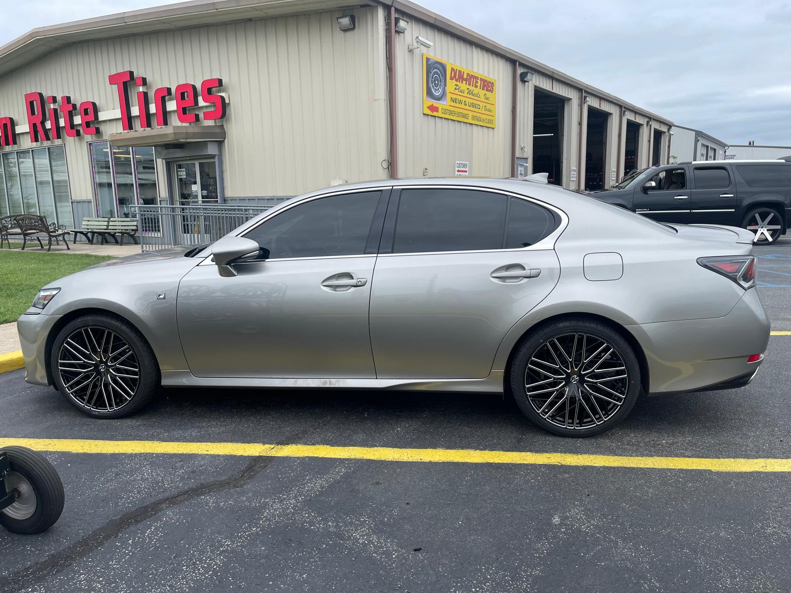 Silver Lexus GS with black mesh wheels