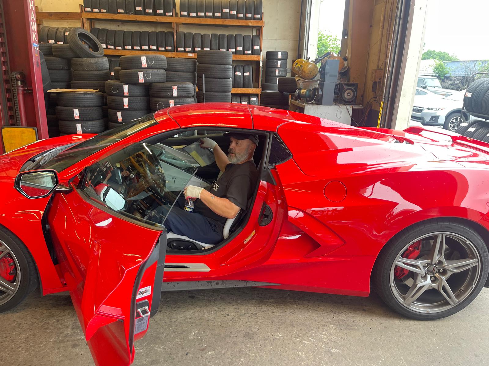 Red Corvette C8 being serviced in our workshop
